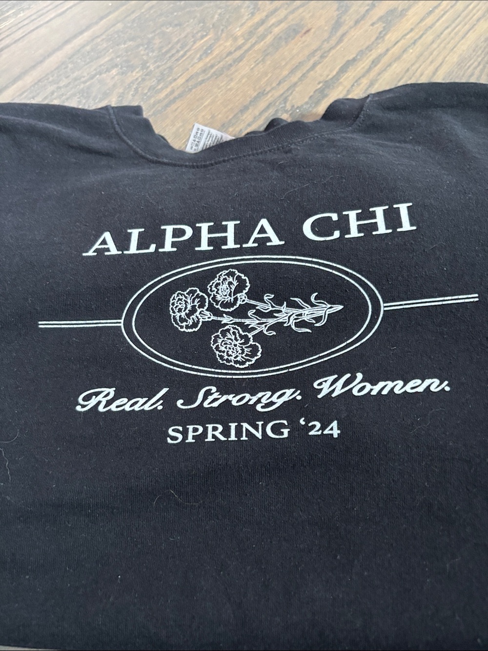Alpha Cho Black Graphic Crewneck T-Shirt - 'Real. Strong. Women.'